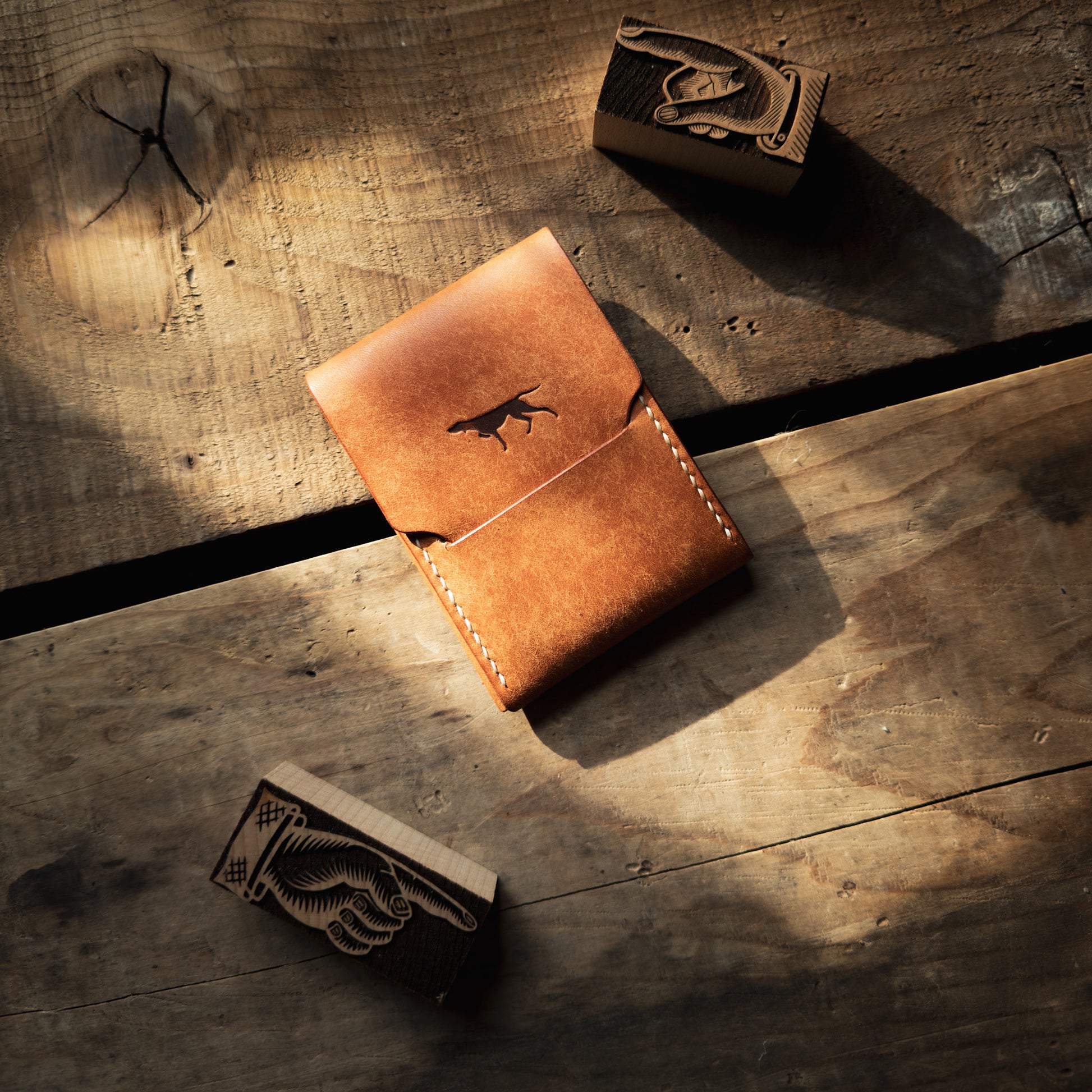Buck wallet by Hound Valley Goods in Olmo Pueblo leather on wood background
