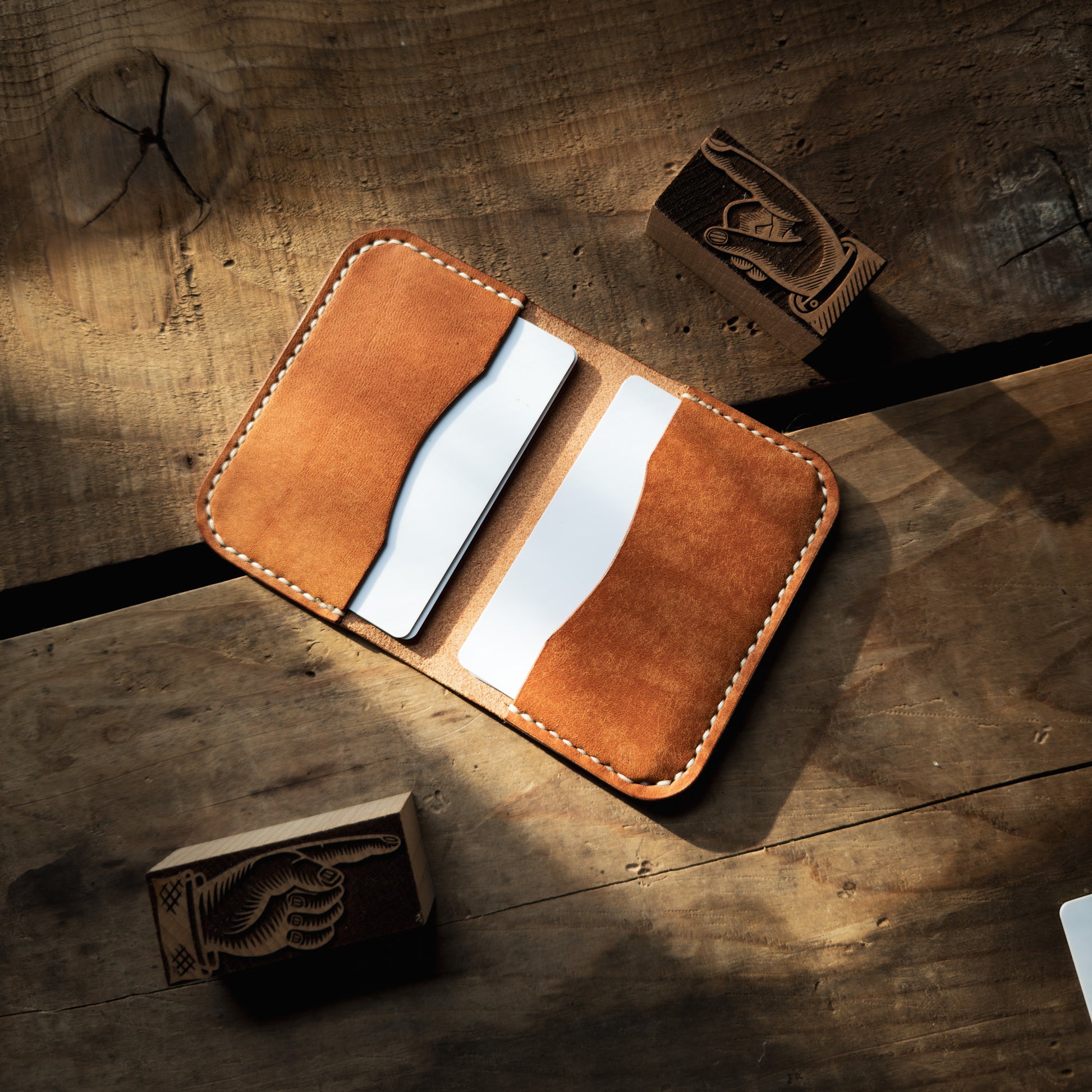 Open shot of Maggie minimalist bifold wallet in Olmo Pueblo