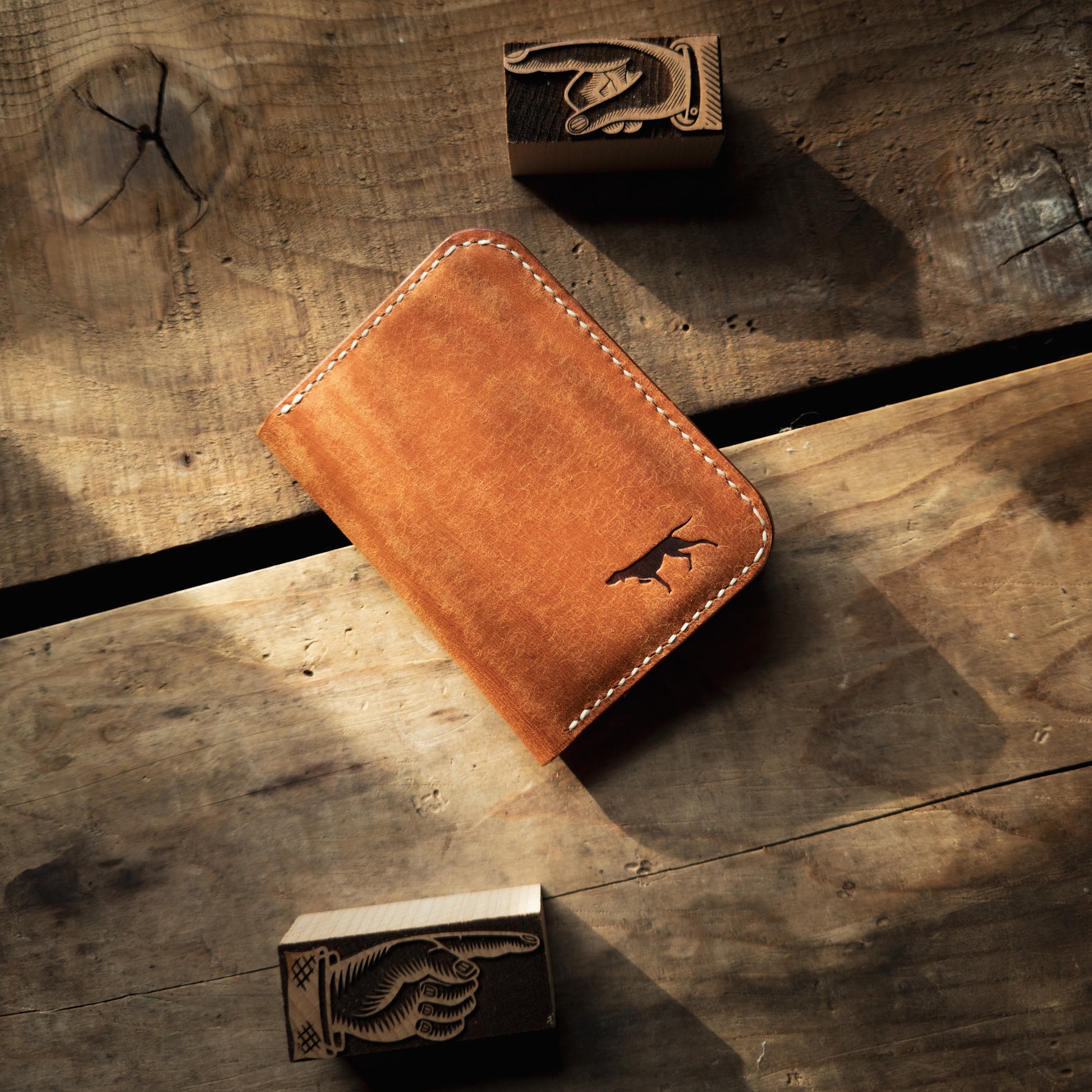 Front of Remy Bifold wallet in Olmo Pueblo